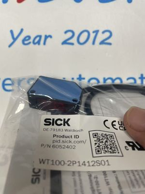 Cảm biến quang điện SICK WT100-2P1412S01 Cảm biến chính xác với khoảng cách phát hiện từ 0 m đến 40 m và độ lặp lại ≤ 2 %